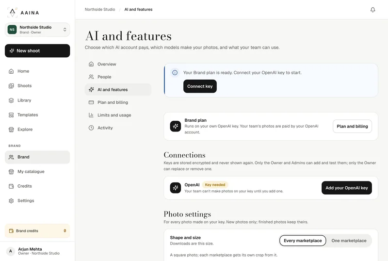 A brand's AI page in Aaina: the connected OpenAI key and where each feature runs