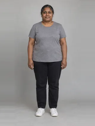 Meenakshi, an Aaina AI studio model: Woman, 56 · South Asian · Plus size