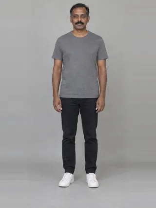 Murugan, an Aaina AI studio model: Man, 44 · South Asian · Slim