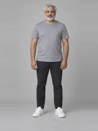 Suresh, an Aaina AI studio model: Man, 56 · South Asian · Average