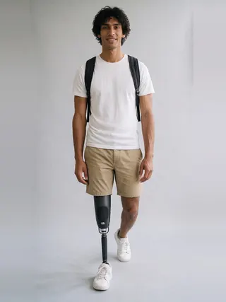Dev, an Aaina AI studio model: Man, 32 · South Asian · Athletic