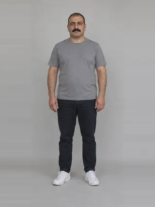 Murat, an Aaina AI studio model: Man, 41 · Middle Eastern · Average