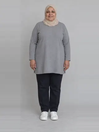 Fatima, an Aaina AI studio model: Woman, 52 · Middle Eastern · Plus size