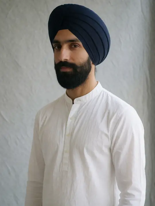 Harpreet, an Aaina model, in the pose Navy dastar, three-quarter camera-left