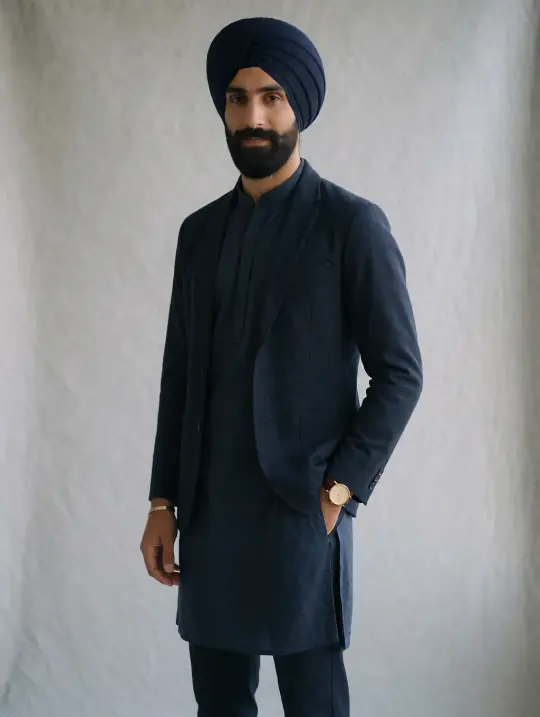 Harpreet, an Aaina model, in the pose Midnight indo-western, three-quarter