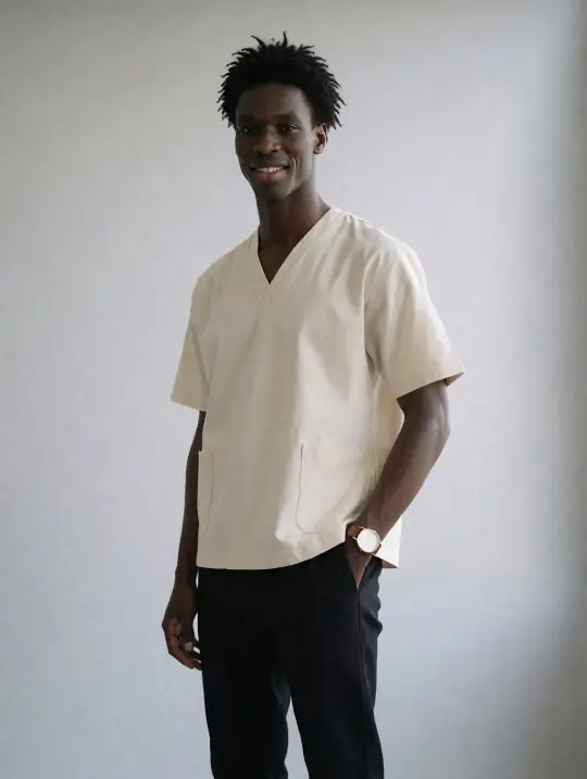Kwame, an Aaina model, in the pose Smock three-quarter, hands in pockets