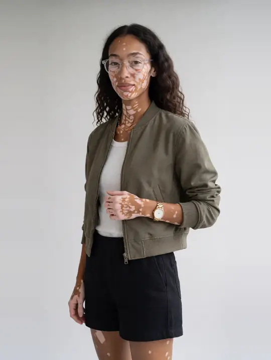Zara, an Aaina model, in the pose Bomber and shorts, three-quarter