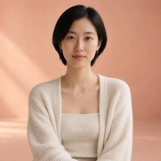 Jiwoo, an Aaina model, wearing or holding the necklace or earrings in the Peach Gradient Studio scene